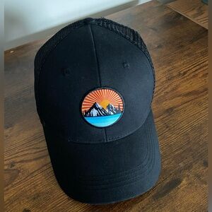 Black Trucker Hat with Sunset Mountain Patch